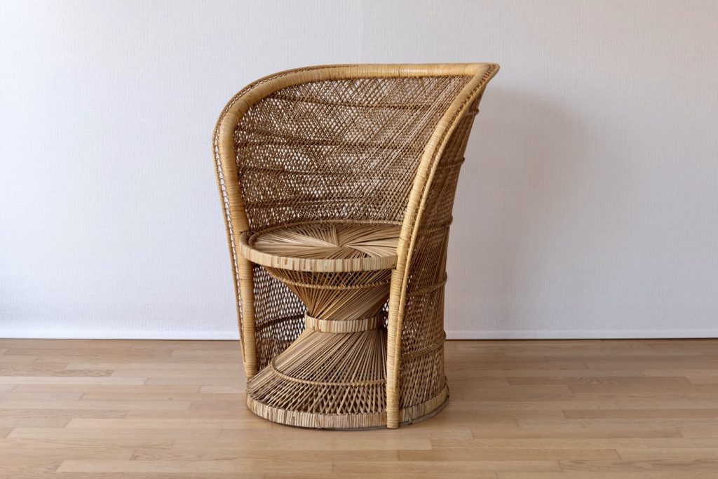 Woven rattan armchair